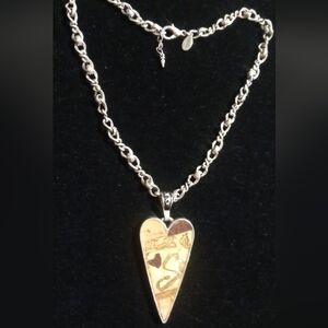 Chico's silver tone distressed figero chain with heart pendant. 18 inches long